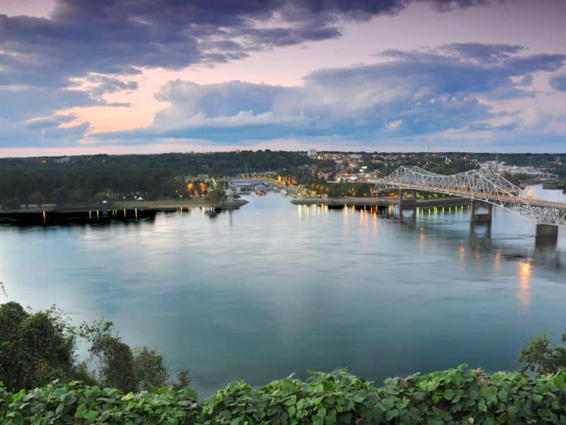 Aerial view of the Tennessee River and bridge in Florence, Alabama used for land surveying and property development planning